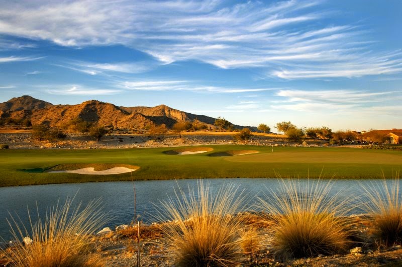 Panoramic view of a lush green golf course at Verrado Golf Club. Smooth