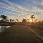 Panoramic view of a lush green golf course at Vestavia Country Club. Smooth
