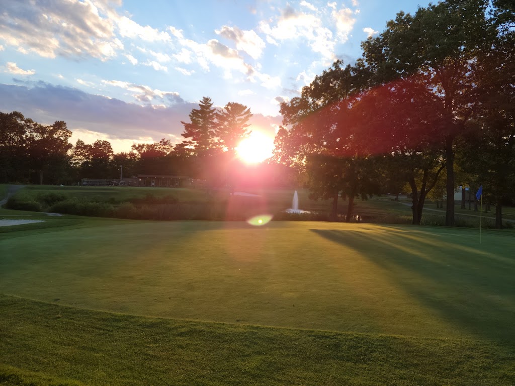 Panoramic view of a lush green golf course at Veterans Memorial Golf Course. Smooth