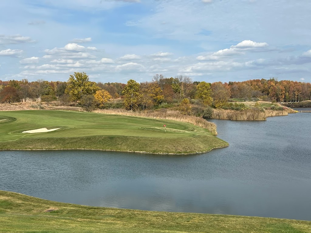Panoramic view of a lush green golf course at Victoria National Golf Club. Smooth