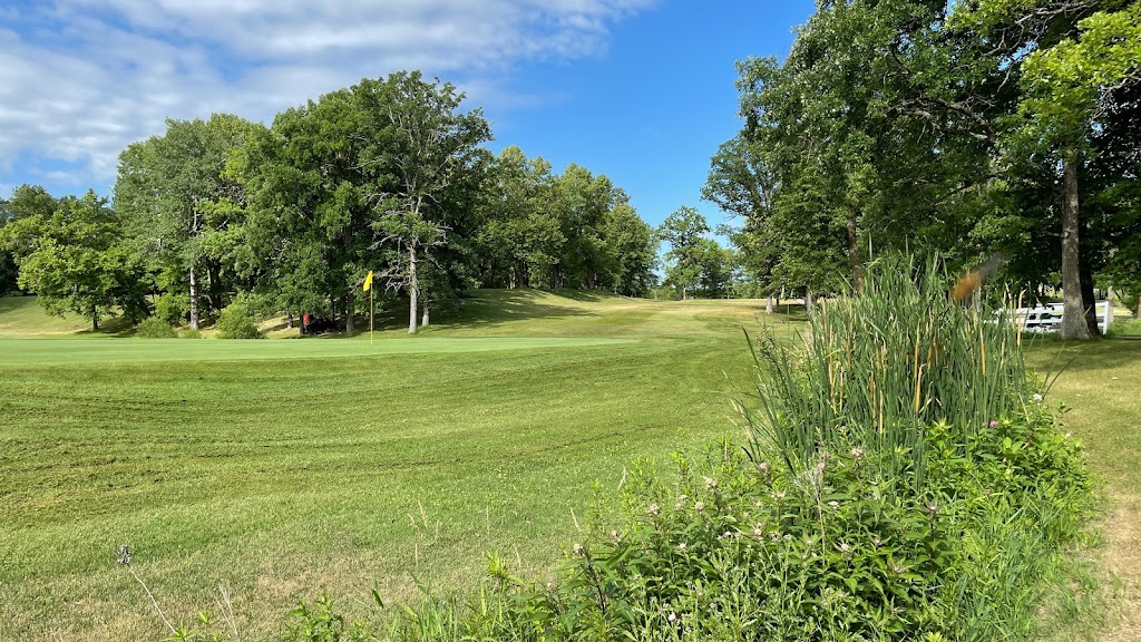 Panoramic view of a lush green golf course at Vintage Golf Course. Smooth