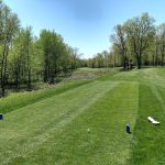 Panoramic view of a lush green golf course at Wabash Valley Golf Club. Smooth