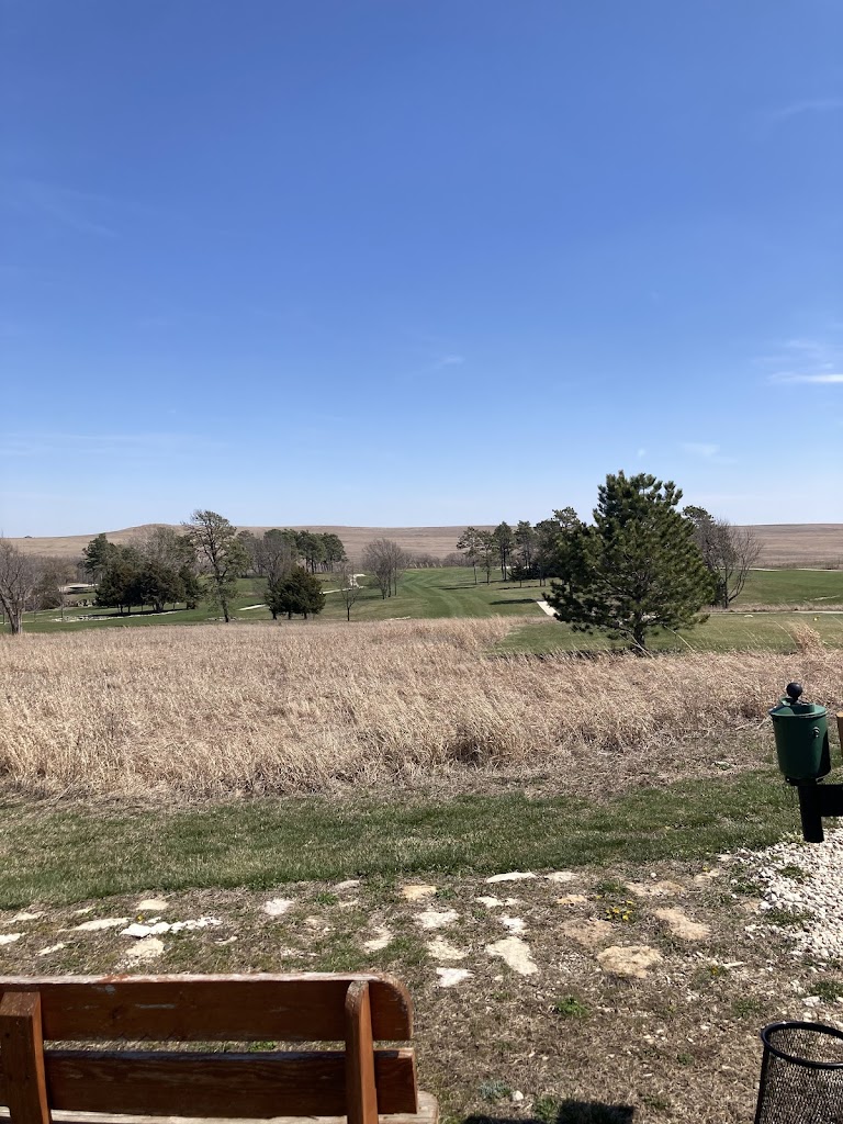 Panoramic view of a lush green golf course at Wabaunsee Pines Golf Course. Smooth