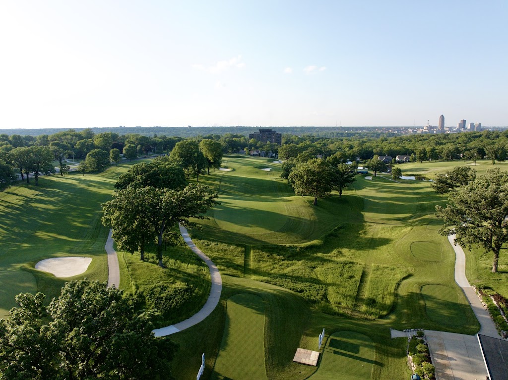 Panoramic view of a lush green golf course at Wakonda Club. Smooth