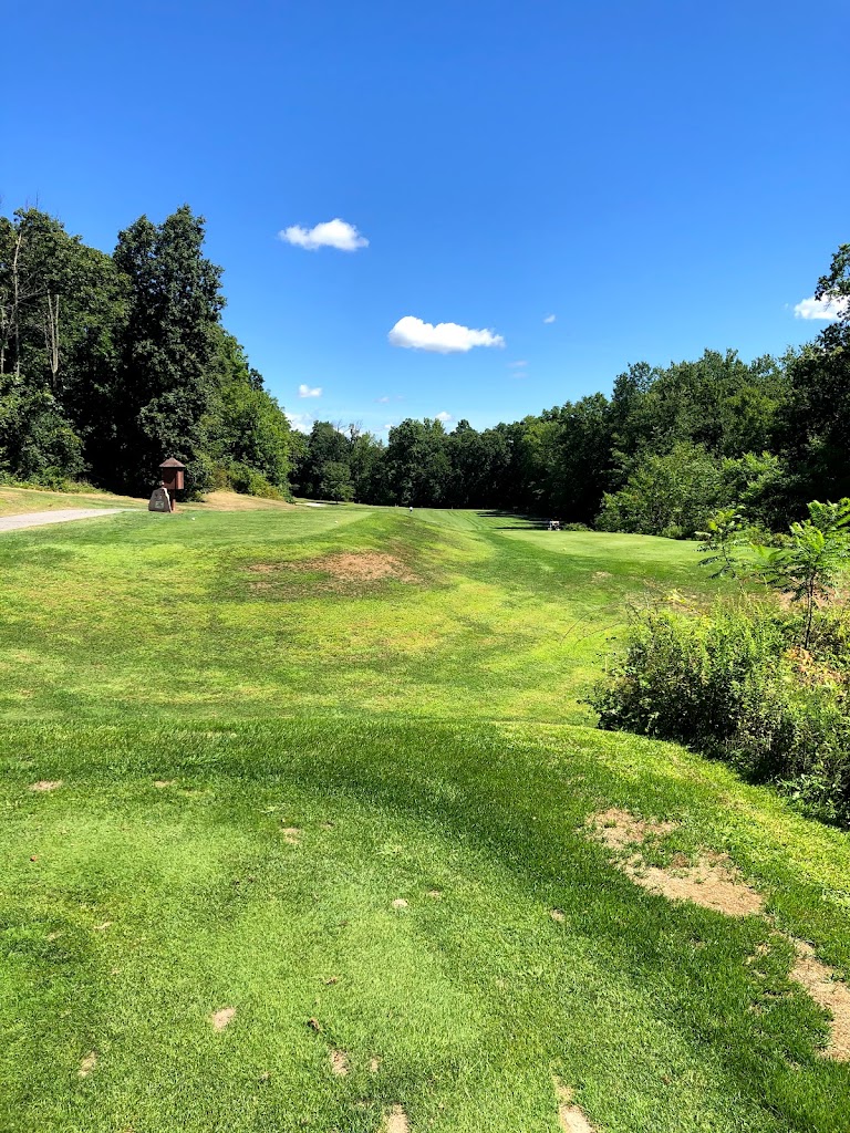 Panoramic view of a lush green golf course at Wallkill Golf Club. Smooth