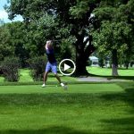 green grass with the flag in the hole.