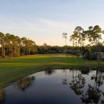 Panoramic view of a lush green golf course at Waterford Golf Club. Smooth