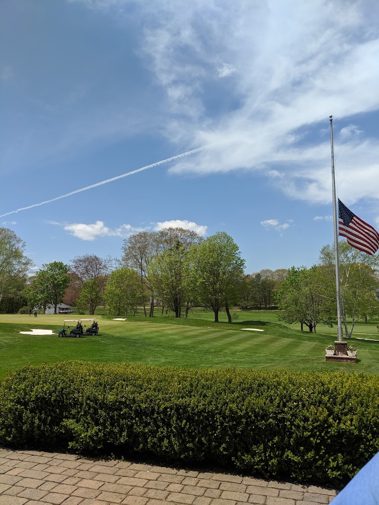 Panoramic view of a lush green golf course at Webhannet Golf Club. Smooth