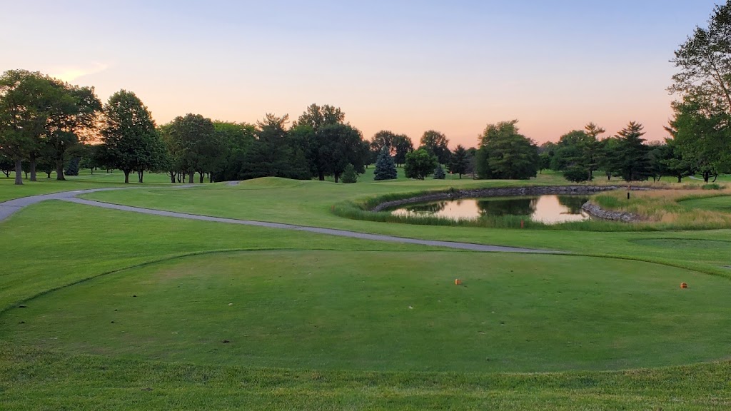 Panoramic view of a lush green golf course at Weibring Golf Club. Smooth