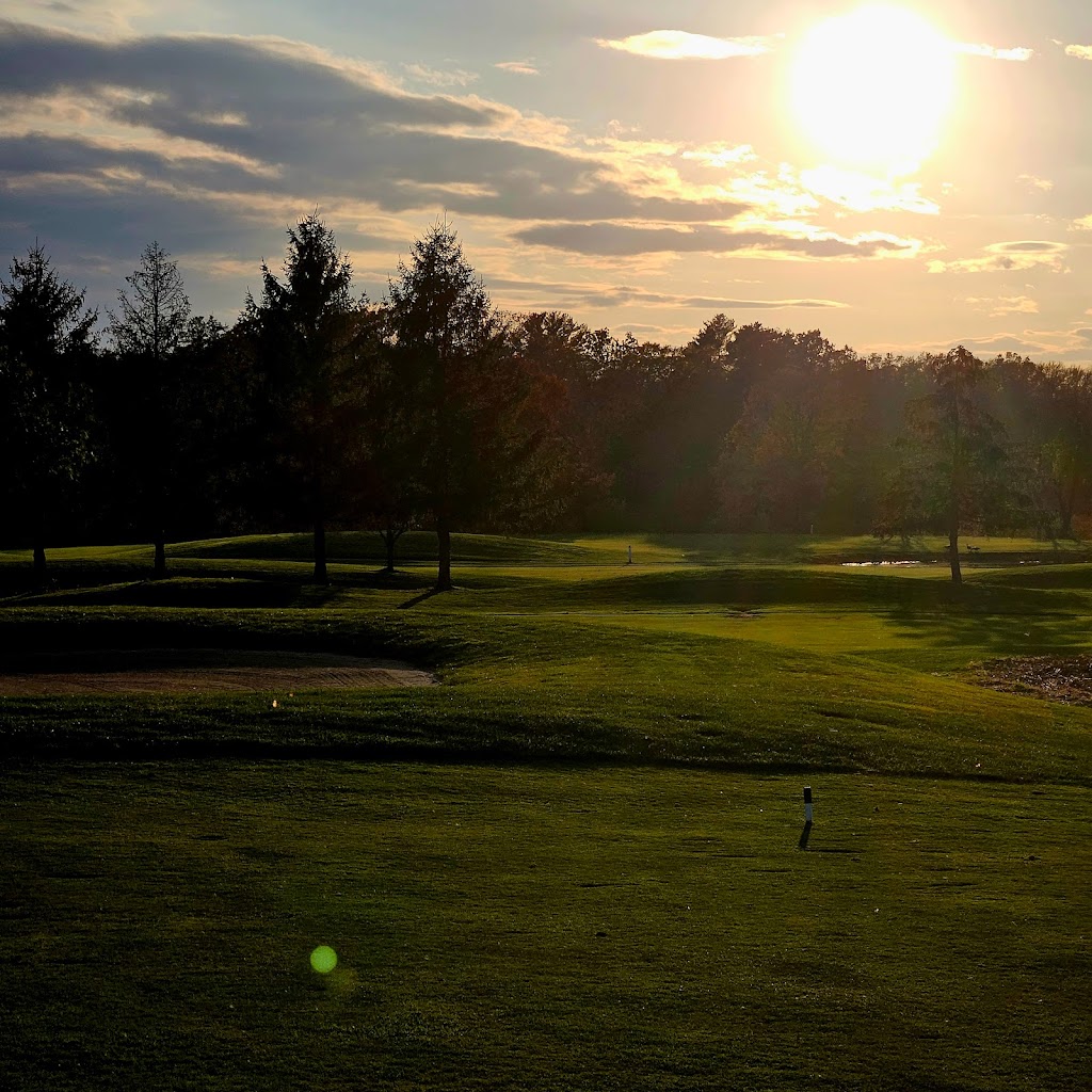 Panoramic view of a lush green golf course at West Bridgewater Country Club. Smooth