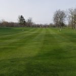 Panoramic view of a lush green golf course at Westwood Golf Club. Smooth