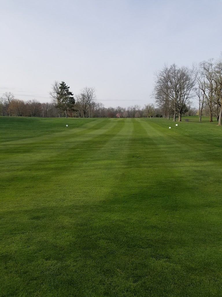 Panoramic view of a lush green golf course at Westwood Golf Club. Smooth