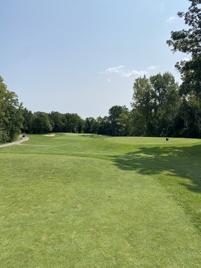 Panoramic view of a lush green golf course at Westwynd Golf Course. Smooth