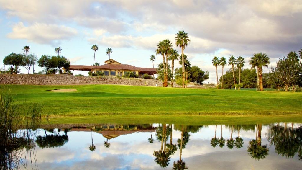 Panoramic view of a lush green golf course at Wickenburg Golf Club. Smooth