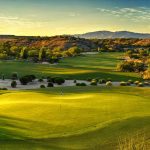 Panoramic view of a lush green golf course at Wickenburg Ranch Golf & Social Club. Smooth