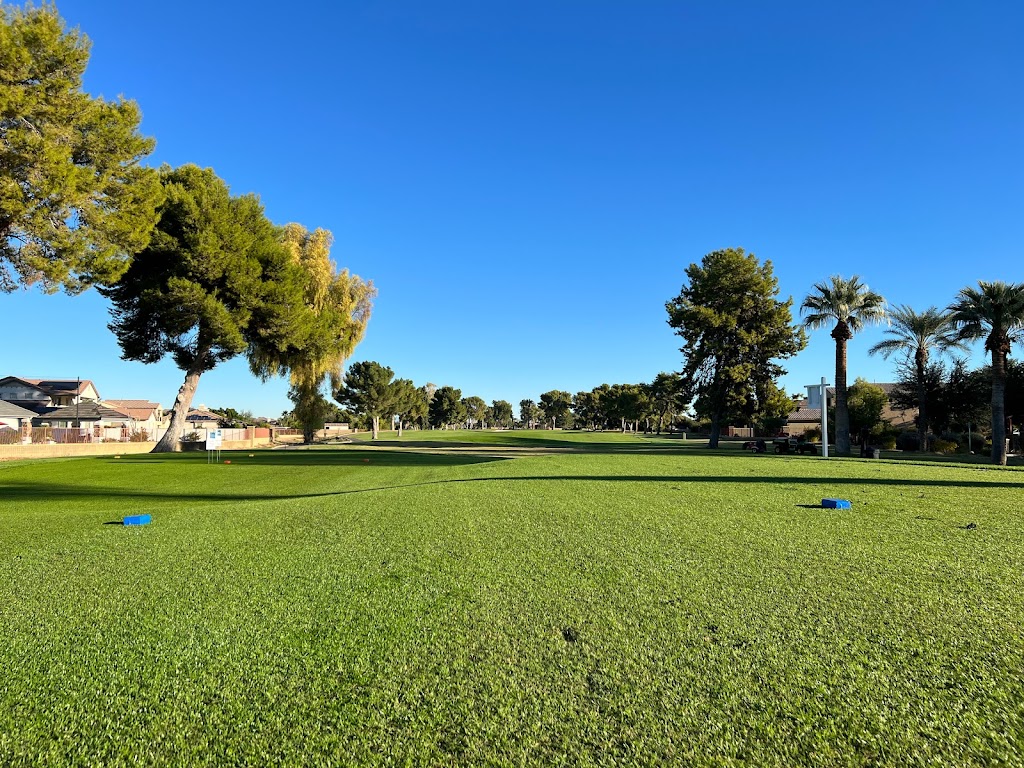 Panoramic view of a lush green golf course at Wigwam Golf Club. Smooth