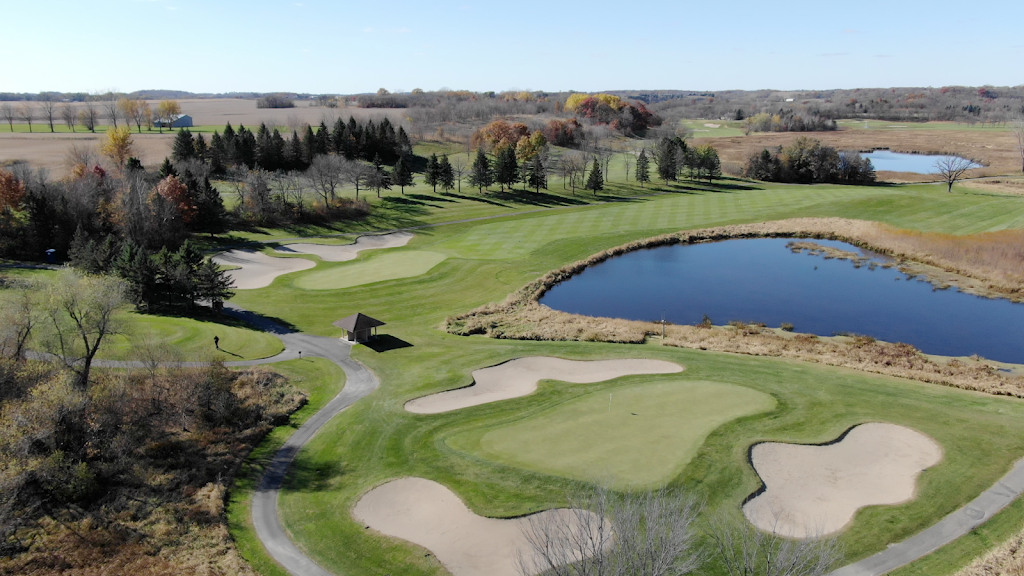 Panoramic view of a lush green golf course at Willinger's Golf Club. Smooth