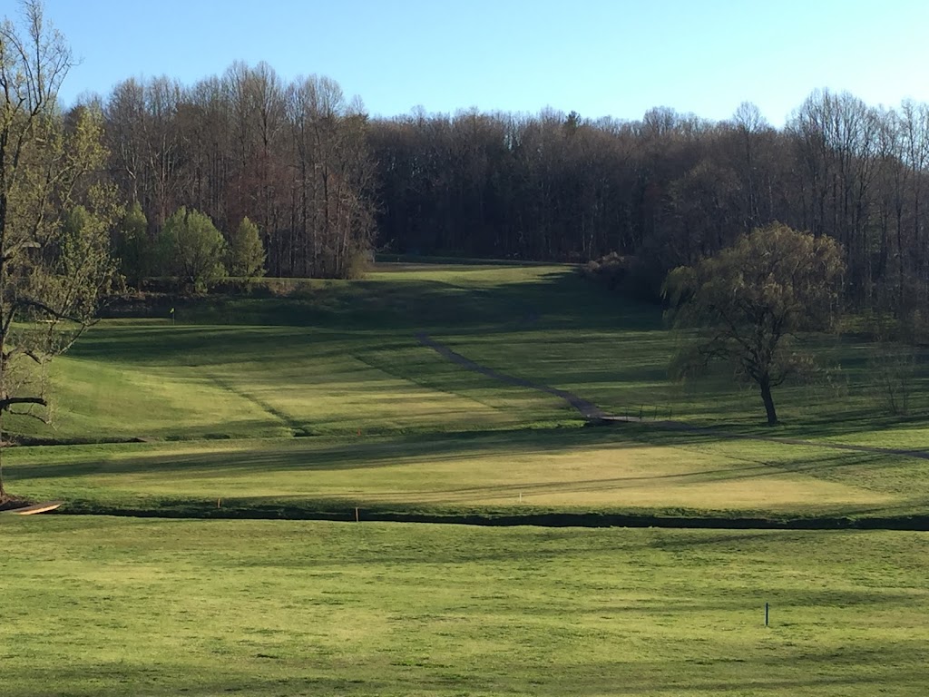 Panoramic view of a lush green golf course at Willow Creek Country Club. Smooth