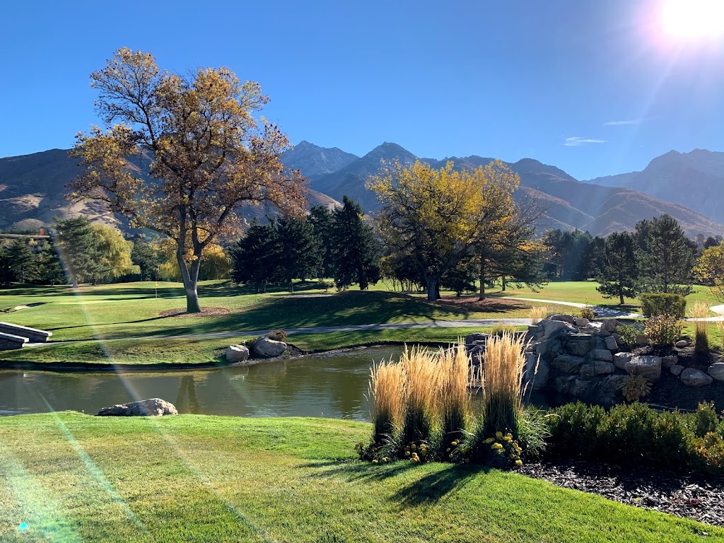 Panoramic view of a lush green golf course at Willow Creek Country Club. Smooth