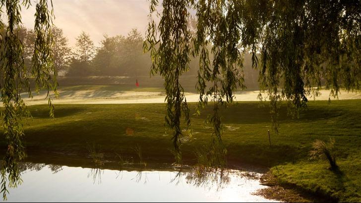 Panoramic view of a lush green golf course at Willow Creek Golf & Country Club - NY. Smooth