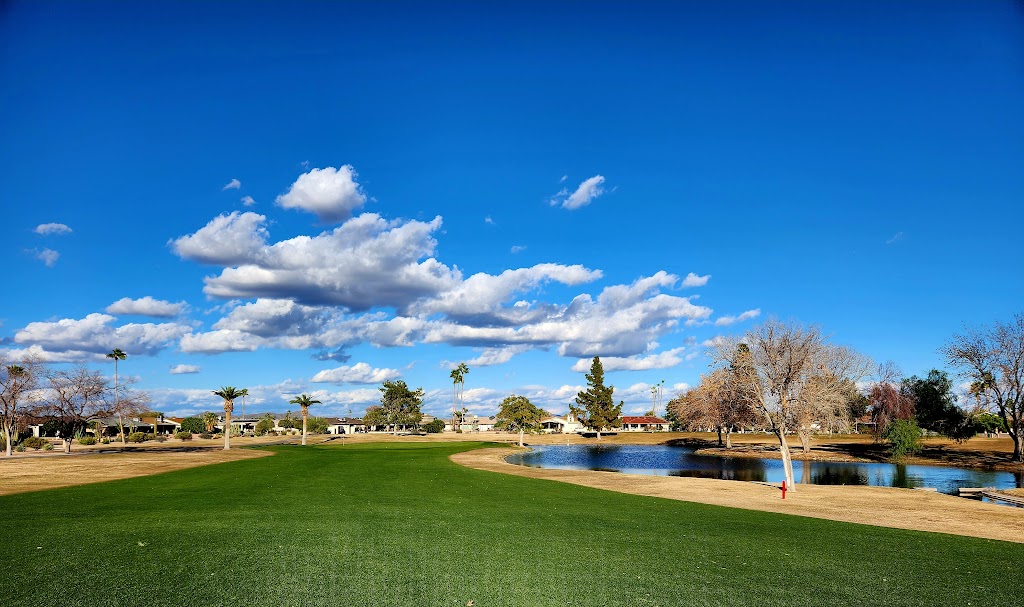 Panoramic view of a lush green golf course at Willow Creek Golf Course. Smooth