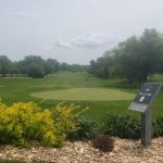 Panoramic view of a lush green golf course at Willow Lakes Golf Course. Smooth