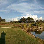 Panoramic view of a lush green golf course at Willow Point Country Club. Smooth