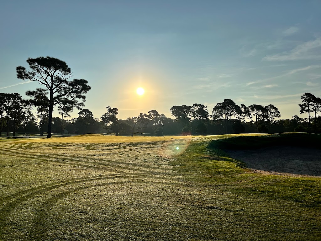 Panoramic view of a lush green golf course at Wilmington Municipal Golf Course. Smooth