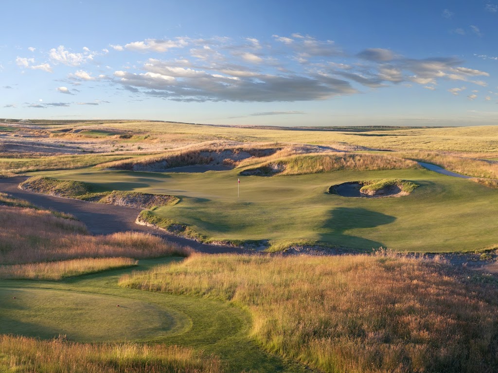 Panoramic view of a lush green golf course at Wine Valley Golf Club. Smooth