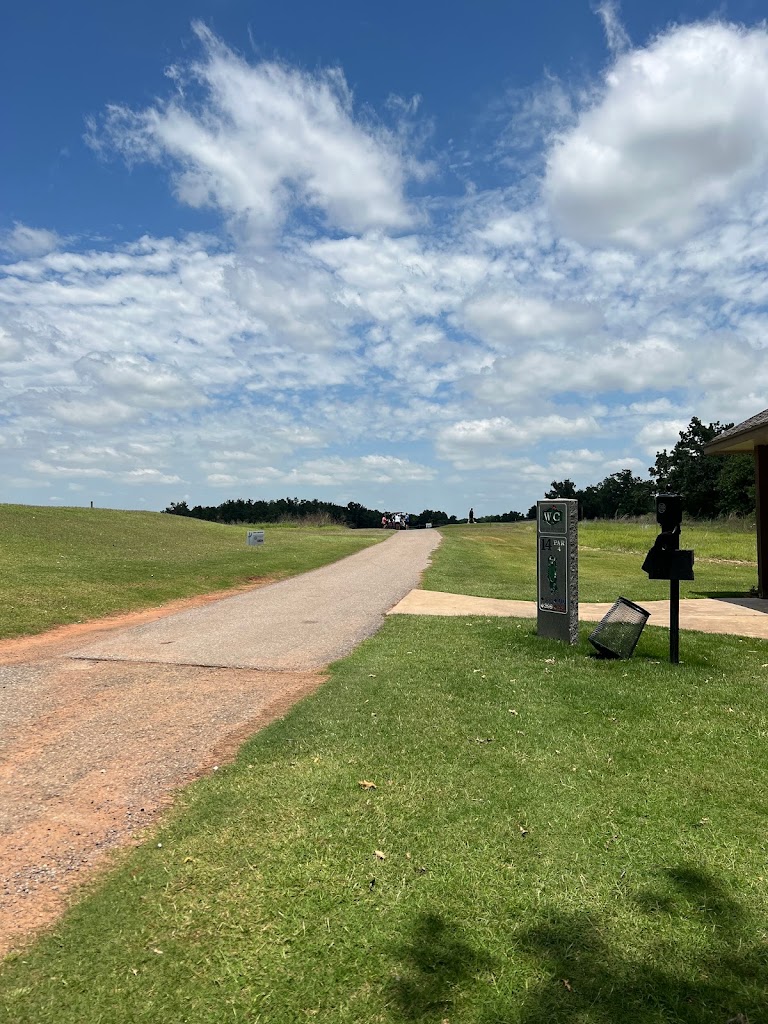 Panoramic view of a lush green golf course at Winter Creek Golf & Social Club. Smooth