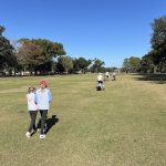 green grass with the flag in the hole.