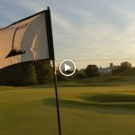 green grass with the flag in the hole.
