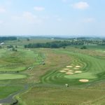 Panoramic view of a lush green golf course at Wyncote Golf Club (The Restaurant at Wyncote). Smooth