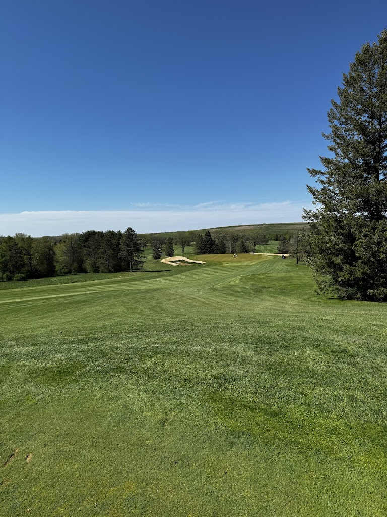 Panoramic view of a lush green golf course at Yahara Hills Golf Course. Smooth