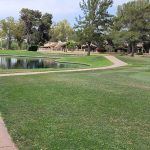 Panoramic view of a lush green golf course at Scottsdale Country Club Golf Course. Smooth