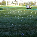 Panoramic view of a lush green golf course at Village Creek Golf Club. Smooth