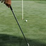 Panoramic view of a lush green golf course at Oak Run Public Golf Course. Smooth